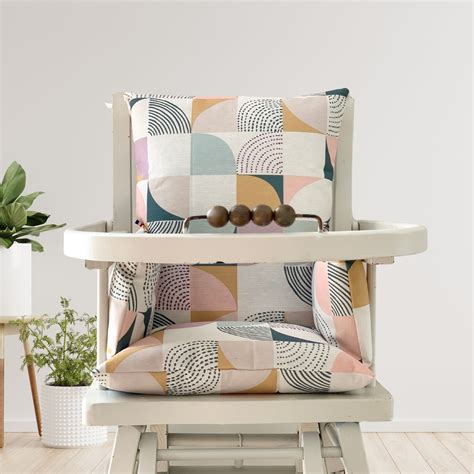 Le Coussin Chaise Haute Combelle : Un Accessoire Essentiel Pour Les Petits