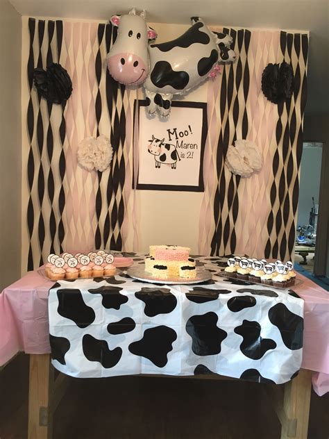 Pink Farm Party pink gingham tablecloths, cow balloons, farm party