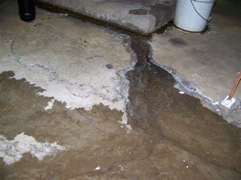 cracks in basement floor leaking water