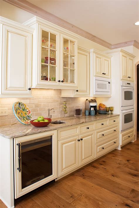 Unveil the Timeless Charm of Cream Colored Kitchen Cabinets: Discover Endless Design Possibilities