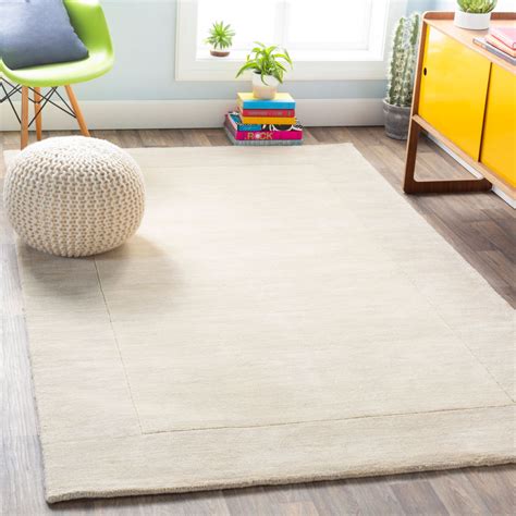 home.furnitureanddecorny.com:cream solid rug