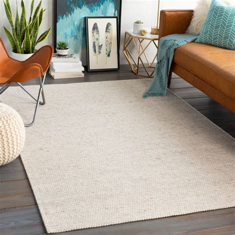 home.furnitureanddecorny.com:cream solid rug