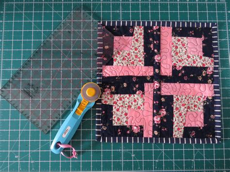 Woman creating her own bedroom quilt