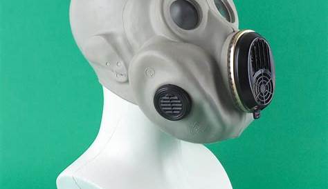 A Scary Scientist In Gas Mask Holding A Green Toxic Chemical Substance
