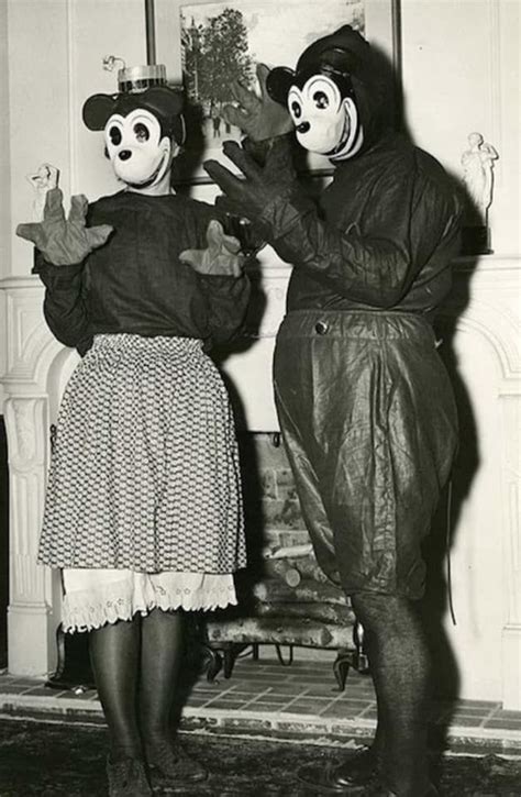 1939Terrified small child poses with first Mickey and Minnie Mouse