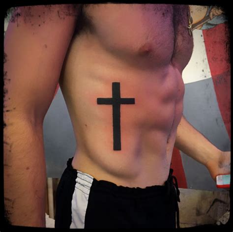 Revolutionary Cross Tattoo Designs On Ribs References