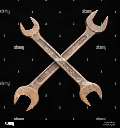 Crossed Crescent Wrenches