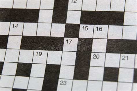 Close-up view of a crossword grid highlighting the interconnectedness of the clues