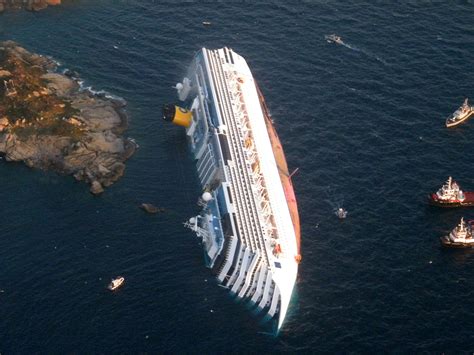 cruise ship runs aground italy