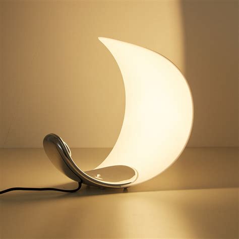 Our beautiful Curl Mirrored Lamp available to view in store or online