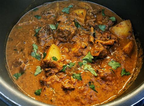 curry goat jamaican history