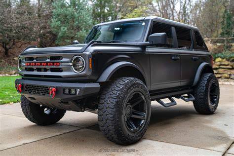 A rugged custom Ford Bronco with off-road modifications