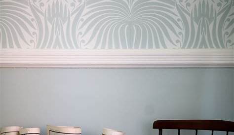 Dado rail with wallpaper above and duck egg blue paint below, room
