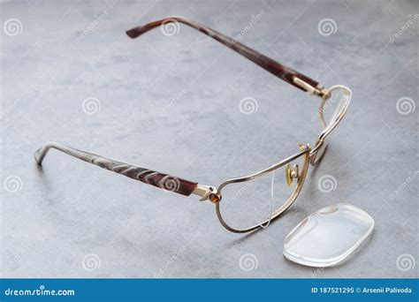 damaged eyeglasses on a table