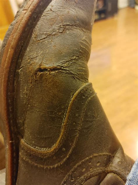 damaged leather boots