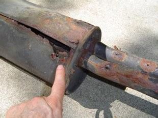 damaged muffler repair