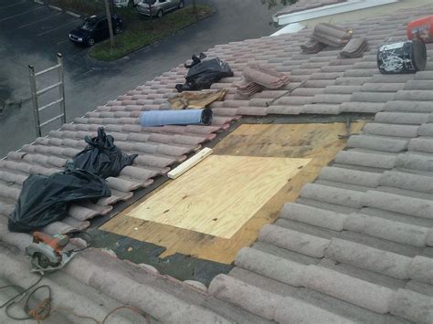 Damaged roof in Boca Raton, FL