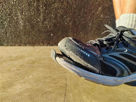 Close-up of damaged shoes