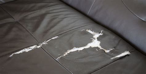 damaged sofa with a tear
