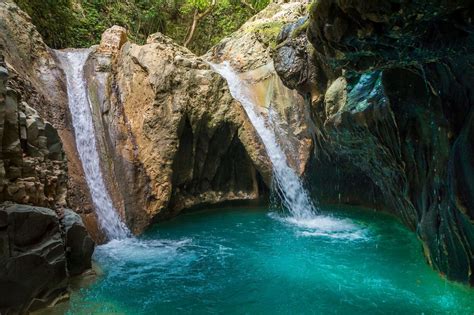 Discover the Hidden Gem: Exploring Damajagua's Mysterious Waterfall Adventure