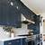 dark blue and wood kitchen cabinets