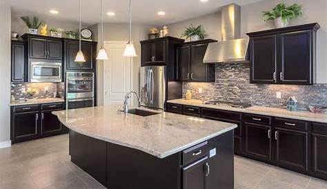 Love this kitchen with dark & light granite