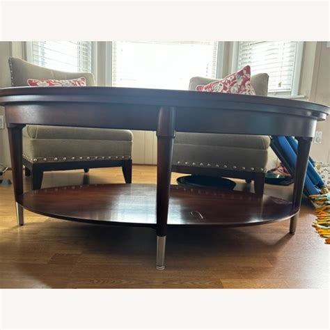 dark brown oval coffee table