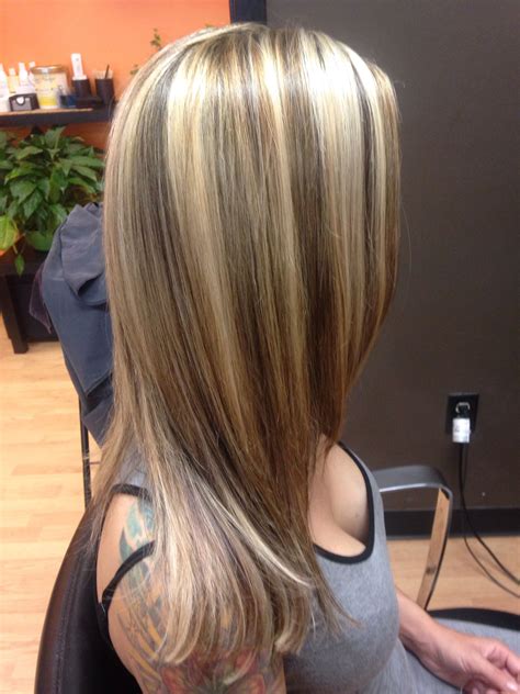 dark brunette hair with blonde highlights
