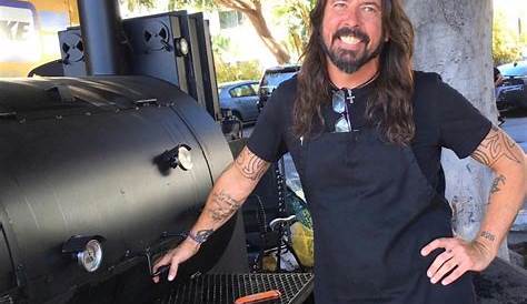 Dave Grohl smokes barbecue during storm to help feed 450 homeless