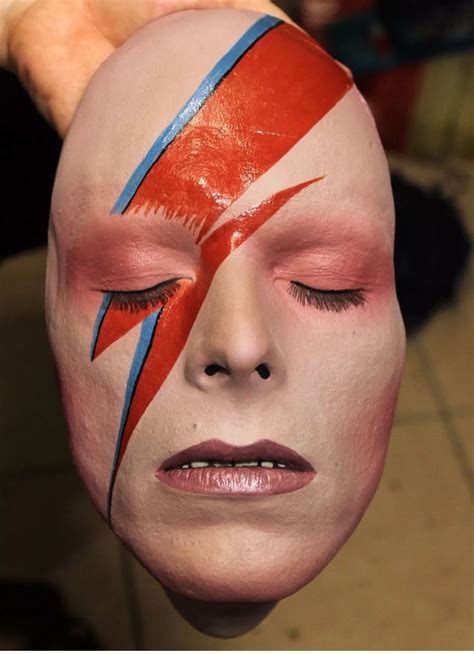 david bowie red jumpsuit and face paint