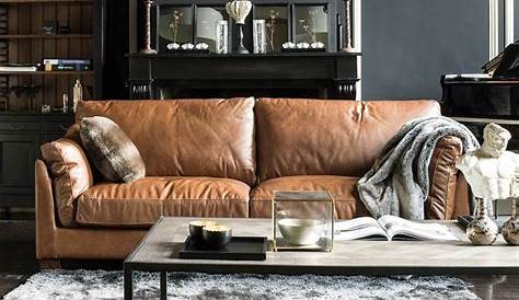 le salon moderne avec un canapé club en cuir marron foncé