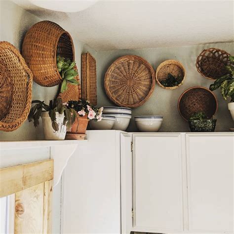 Decorating Above Kitchen Cabinets With Baskets