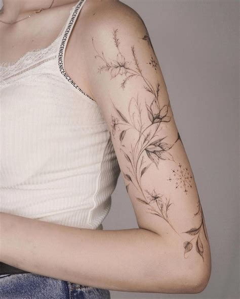 Delicate Floral Arm Tattoo