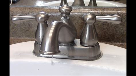 delta sink faucet leaking from base