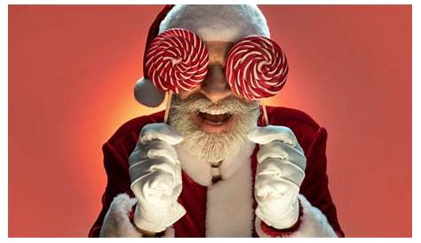 Demented Santa Claus Crazy With Dollar Glasses Stock Photo