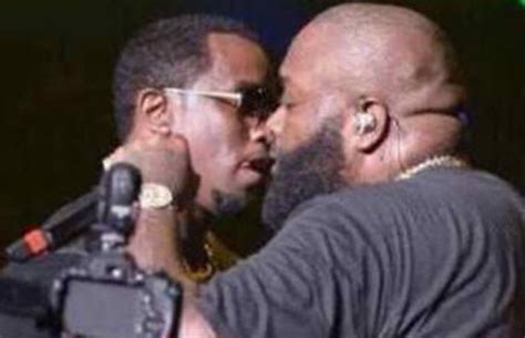 diddy kissing a man