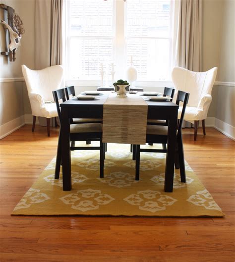 dining room table with rug