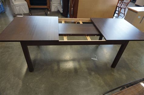 Dining Table With Hidden Extensions