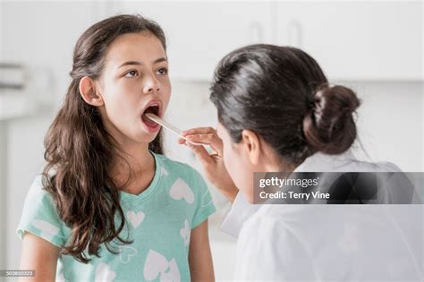 Doctor Checking Tongue