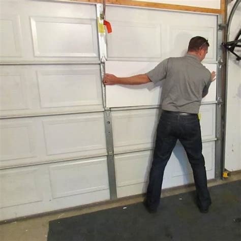 does garage door with polystyrene sandwiched between steeel break down