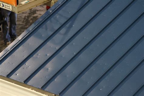 does hail damage a metal roof