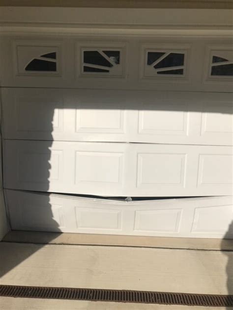 does home owners cover backing into garage door