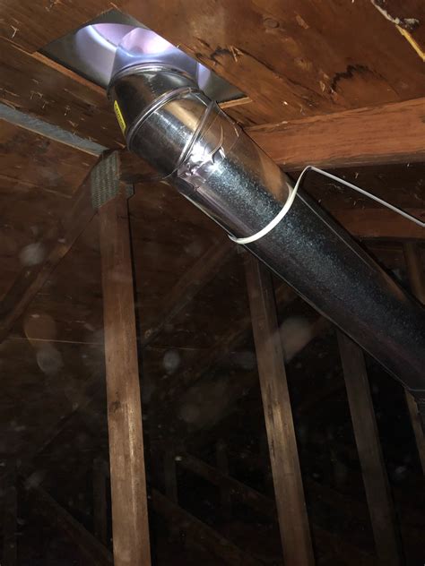 does hood go in to attic or outside house