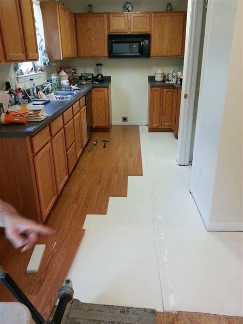does kitchen flooring go under appliances