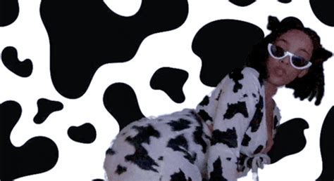doja cat covered in cow print