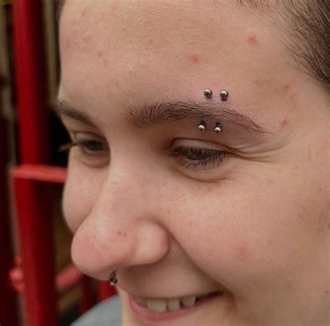 Double Eyebrow Piercing