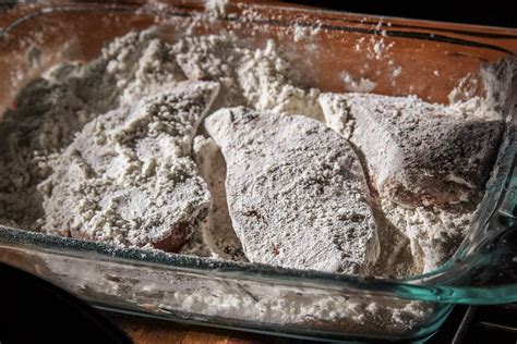 Dredging the liver slices in flour
