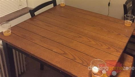Drinking Game With Cups On Corner Of Table