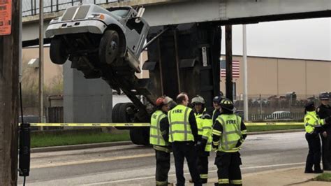 dump truck hits pedestrian bridge