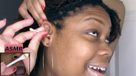 Man Removing Wax from Ear Using Qtip Stock Photo Image of stick